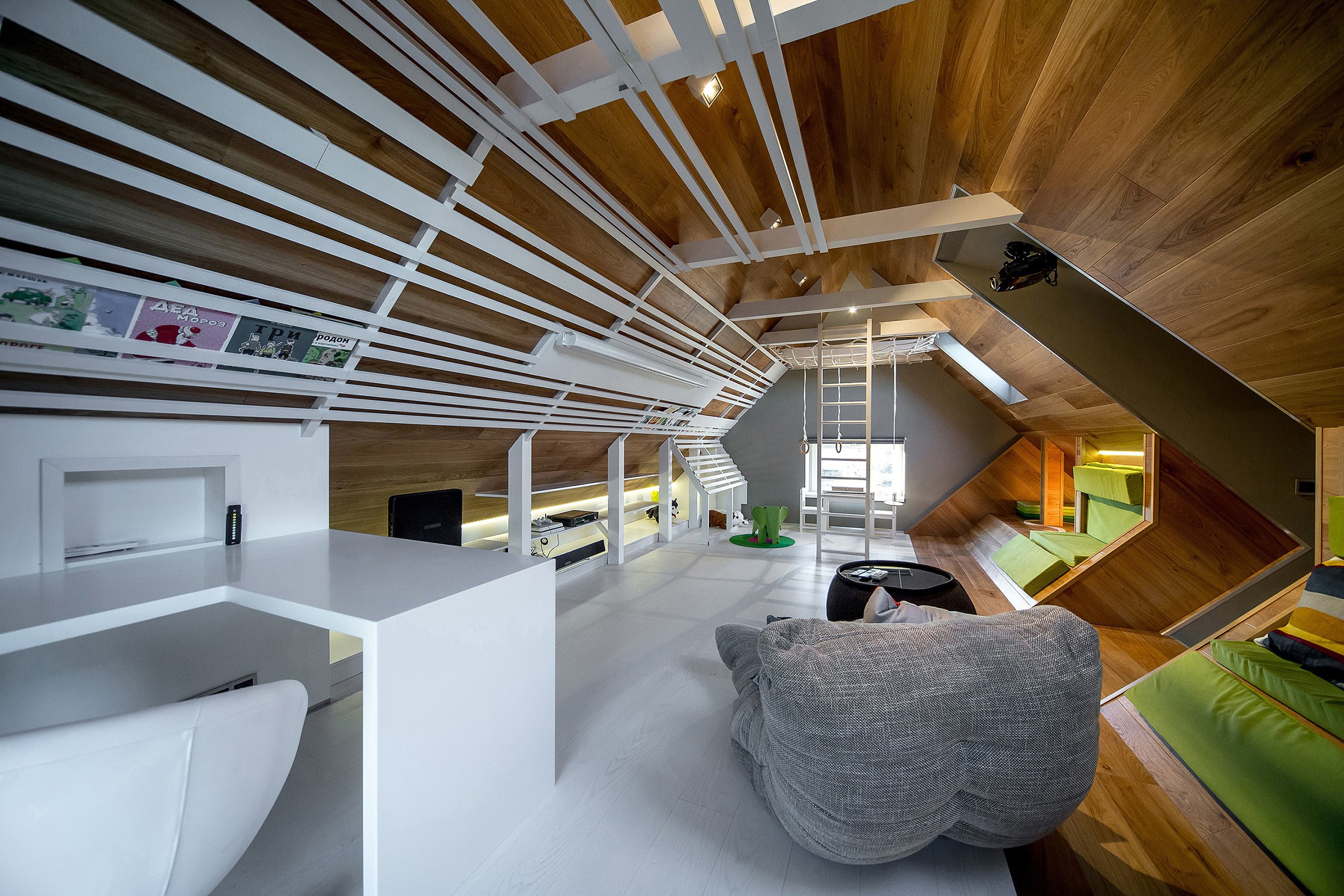 Modern interior design of an attic with Acoustic Sofa and Versa Table bean bags.